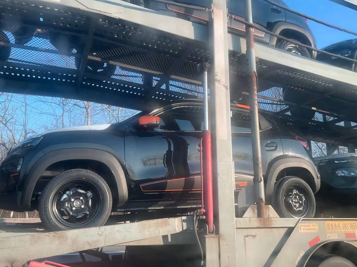 European-market electric cars on a transporter in China
