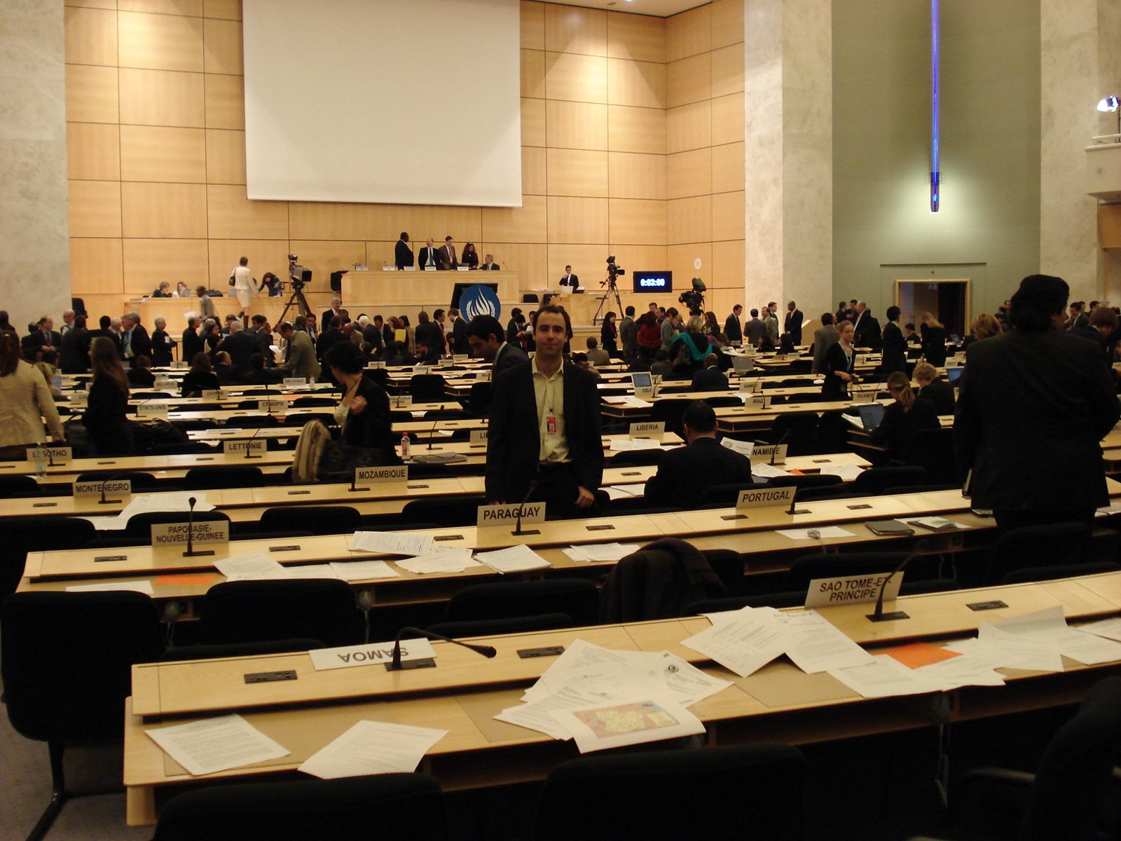 Delegates during a break at a Human Rights Council session in Geneva